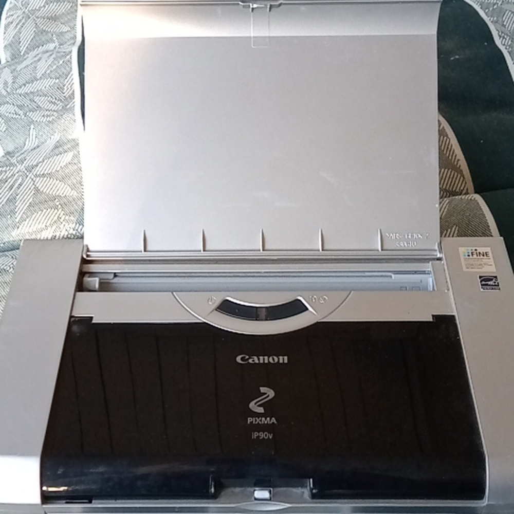 Canon PIXMA iP90v mini printer.